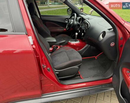 Червоний Ніссан Жук, об'ємом двигуна 1.6 л та пробігом 151 тис. км за 9900 $, фото 18 на Automoto.ua