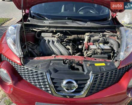 Червоний Ніссан Жук, об'ємом двигуна 1.6 л та пробігом 94 тис. км за 11500 $, фото 7 на Automoto.ua