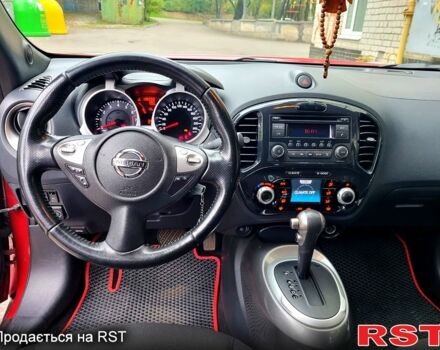Красный Ниссан Жук, объемом двигателя 1.6 л и пробегом 130 тыс. км за 10700 $, фото 11 на Automoto.ua