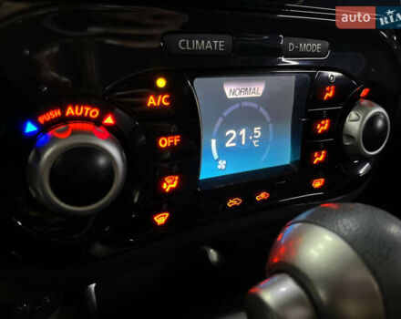 Червоний Ніссан Жук, об'ємом двигуна 1.6 л та пробігом 120 тис. км за 10000 $, фото 9 на Automoto.ua