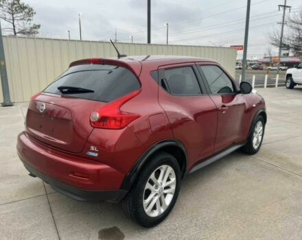 Червоний Ніссан Жук, об'ємом двигуна 1.6 л та пробігом 80 тис. км за 12600 $, фото 4 на Automoto.ua