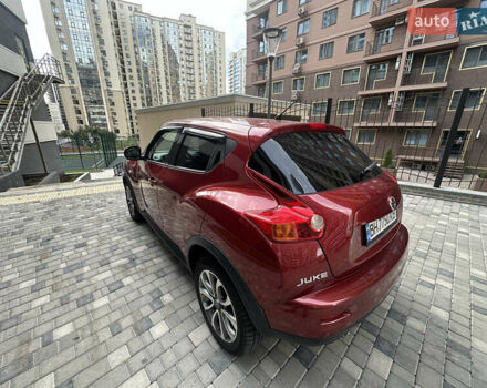 Червоний Ніссан Жук, об'ємом двигуна 1.6 л та пробігом 102 тис. км за 8950 $, фото 2 на Automoto.ua