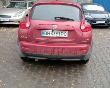 Красный Ниссан Жук, объемом двигателя 2 л и пробегом 126 тыс. км за 8900 $, фото 2 на Automoto.ua