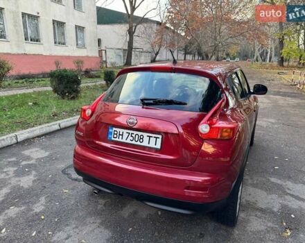 Красный Ниссан Жук, объемом двигателя 1.6 л и пробегом 170 тыс. км за 10300 $, фото 16 на Automoto.ua