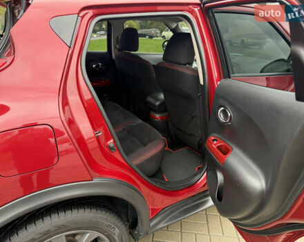 Червоний Ніссан Жук, об'ємом двигуна 1.6 л та пробігом 151 тис. км за 9900 $, фото 19 на Automoto.ua