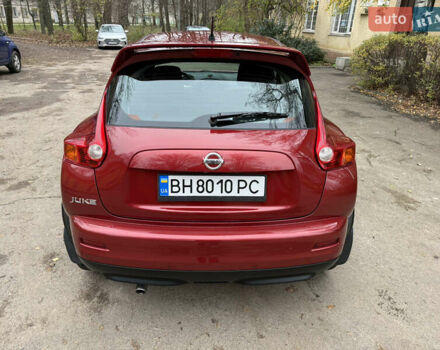 Красный Ниссан Жук, объемом двигателя 1.6 л и пробегом 130 тыс. км за 10500 $, фото 18 на Automoto.ua