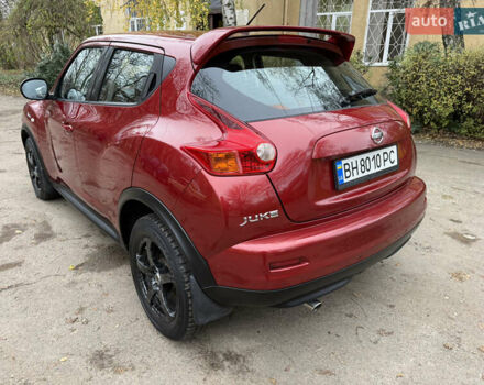 Красный Ниссан Жук, объемом двигателя 1.6 л и пробегом 130 тыс. км за 10500 $, фото 24 на Automoto.ua