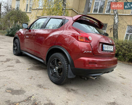 Красный Ниссан Жук, объемом двигателя 1.6 л и пробегом 130 тыс. км за 10500 $, фото 28 на Automoto.ua