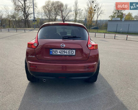 Красный Ниссан Жук, объемом двигателя 1.62 л и пробегом 68 тыс. км за 12200 $, фото 4 на Automoto.ua