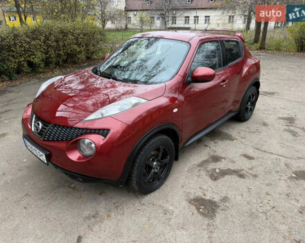 Красный Ниссан Жук, объемом двигателя 1.6 л и пробегом 130 тыс. км за 10500 $, фото 1 на Automoto.ua