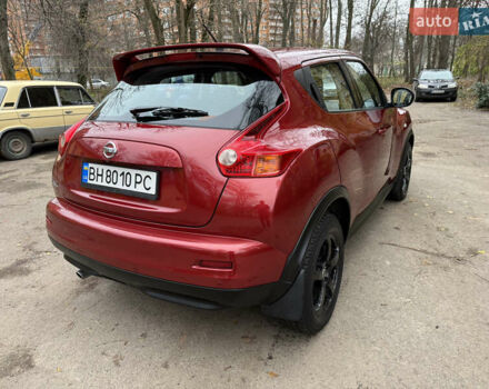 Красный Ниссан Жук, объемом двигателя 1.6 л и пробегом 130 тыс. км за 10500 $, фото 13 на Automoto.ua