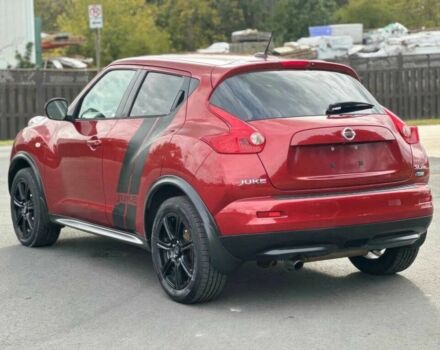 Червоний Ніссан Жук, об'ємом двигуна 1.6 л та пробігом 89 тис. км за 5500 $, фото 7 на Automoto.ua