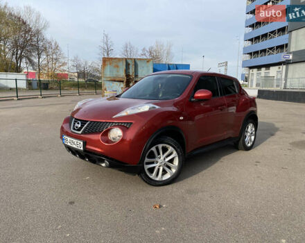 Красный Ниссан Жук, объемом двигателя 1.62 л и пробегом 68 тыс. км за 12200 $, фото 1 на Automoto.ua