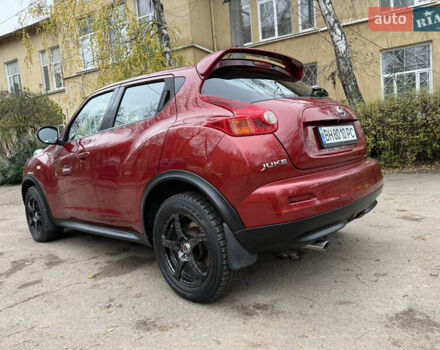 Красный Ниссан Жук, объемом двигателя 1.6 л и пробегом 130 тыс. км за 10500 $, фото 22 на Automoto.ua