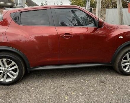 Красный Ниссан Жук, объемом двигателя 1.62 л и пробегом 209 тыс. км за 10500 $, фото 2 на Automoto.ua