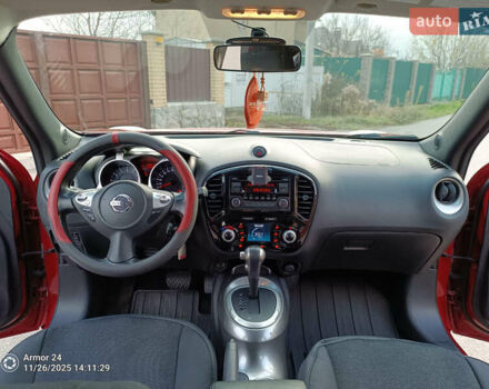 Червоний Ніссан Жук, об'ємом двигуна 1.6 л та пробігом 66 тис. км за 11000 $, фото 14 на Automoto.ua