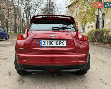 Красный Ниссан Жук, объемом двигателя 1.6 л и пробегом 130 тыс. км за 10500 $, фото 19 на Automoto.ua