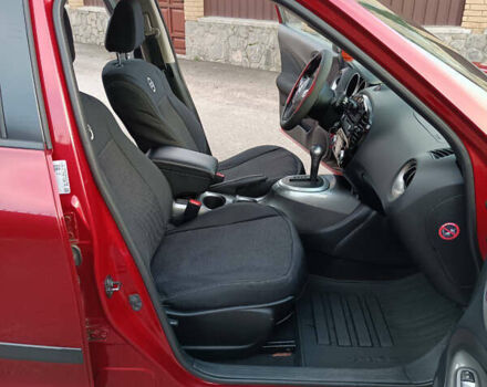 Червоний Ніссан Жук, об'ємом двигуна 1.6 л та пробігом 66 тис. км за 11000 $, фото 8 на Automoto.ua