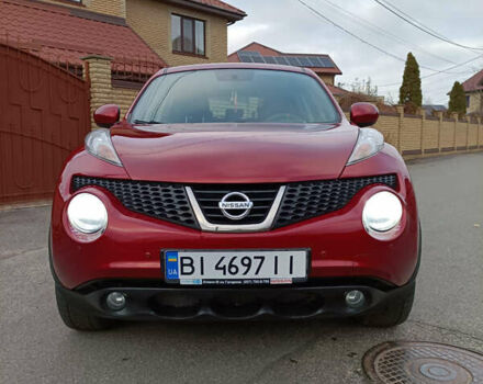 Червоний Ніссан Жук, об'ємом двигуна 1.6 л та пробігом 66 тис. км за 11000 $, фото 4 на Automoto.ua