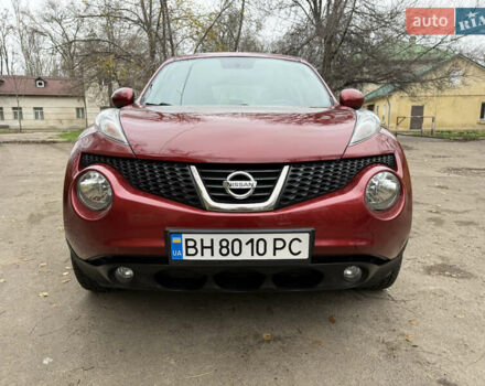 Красный Ниссан Жук, объемом двигателя 1.6 л и пробегом 130 тыс. км за 10500 $, фото 4 на Automoto.ua