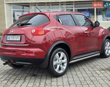 Красный Ниссан Жук, объемом двигателя 1.6 л и пробегом 127 тыс. км за 9777 $, фото 3 на Automoto.ua