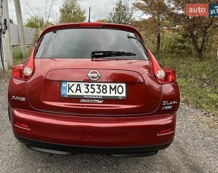 Красный Ниссан Жук, объемом двигателя 1.62 л и пробегом 209 тыс. км за 10500 $, фото 1 на Automoto.ua