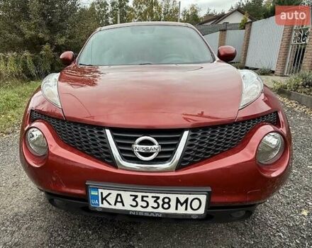 Красный Ниссан Жук, объемом двигателя 1.62 л и пробегом 209 тыс. км за 10500 $, фото 3 на Automoto.ua