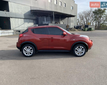 Красный Ниссан Жук, объемом двигателя 1.62 л и пробегом 68 тыс. км за 12200 $, фото 6 на Automoto.ua
