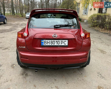 Красный Ниссан Жук, объемом двигателя 1.6 л и пробегом 130 тыс. км за 10500 $, фото 17 на Automoto.ua