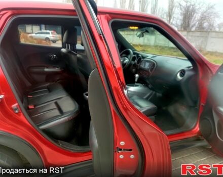 Червоний Ніссан Жук, об'ємом двигуна 1.6 л та пробігом 125 тис. км за 11950 $, фото 8 на Automoto.ua