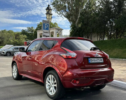 Красный Ниссан Жук, объемом двигателя 1.6 л и пробегом 102 тыс. км за 12300 $, фото 3 на Automoto.ua