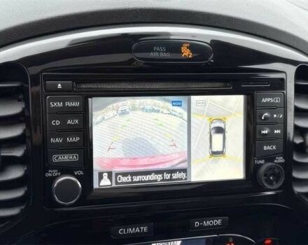 Красный Ниссан Жук, объемом двигателя 1.6 л и пробегом 72 тыс. км за 8900 $, фото 10 на Automoto.ua