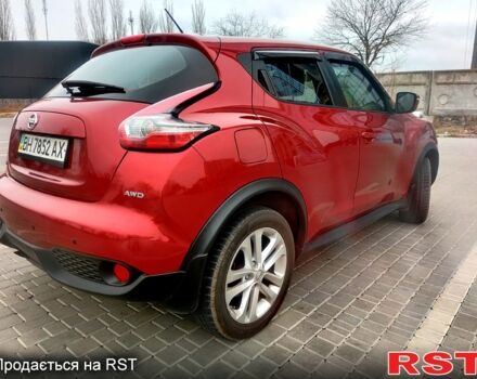 Червоний Ніссан Жук, об'ємом двигуна 1.6 л та пробігом 125 тис. км за 11950 $, фото 6 на Automoto.ua