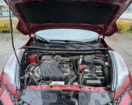 Красный Ниссан Жук, объемом двигателя 1.6 л и пробегом 58 тыс. км за 13000 $, фото 10 на Automoto.ua