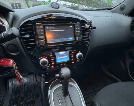 Красный Ниссан Жук, объемом двигателя 1.6 л и пробегом 58 тыс. км за 13000 $, фото 7 на Automoto.ua