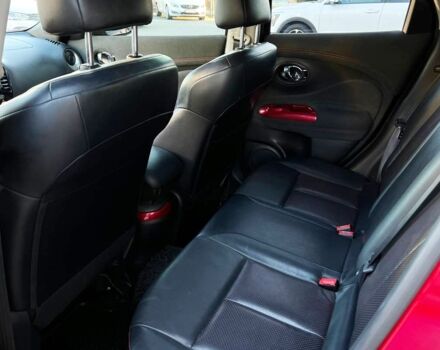 Червоний Ніссан Жук, об'ємом двигуна 1.6 л та пробігом 95 тис. км за 13300 $, фото 14 на Automoto.ua