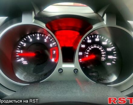 Червоний Ніссан Жук, об'ємом двигуна 1.6 л та пробігом 125 тис. км за 11950 $, фото 9 на Automoto.ua