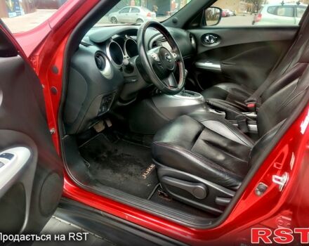 Червоний Ніссан Жук, об'ємом двигуна 1.6 л та пробігом 125 тис. км за 11950 $, фото 11 на Automoto.ua