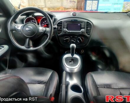 Червоний Ніссан Жук, об'ємом двигуна 1.6 л та пробігом 125 тис. км за 11950 $, фото 10 на Automoto.ua