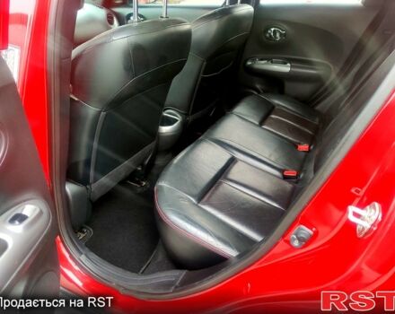 Червоний Ніссан Жук, об'ємом двигуна 1.6 л та пробігом 125 тис. км за 11950 $, фото 12 на Automoto.ua