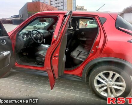 Червоний Ніссан Жук, об'ємом двигуна 1.6 л та пробігом 125 тис. км за 11950 $, фото 7 на Automoto.ua