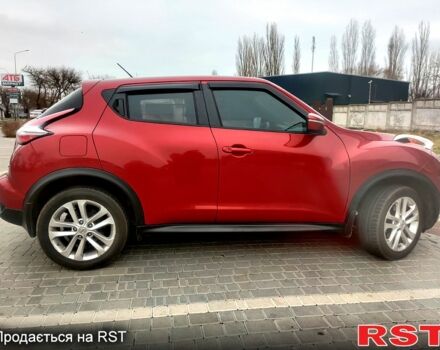 Червоний Ніссан Жук, об'ємом двигуна 1.6 л та пробігом 125 тис. км за 11950 $, фото 5 на Automoto.ua