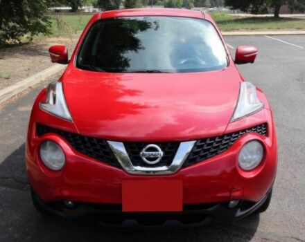 Красный Ниссан Жук, объемом двигателя 1.6 л и пробегом 72 тыс. км за 8000 $, фото 1 на Automoto.ua