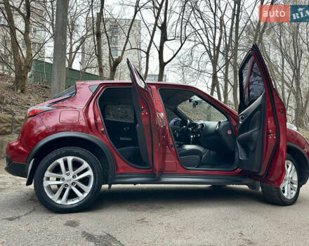 Червоний Ніссан Жук, об'ємом двигуна 1.6 л та пробігом 97 тис. км за 12000 $, фото 7 на Automoto.ua