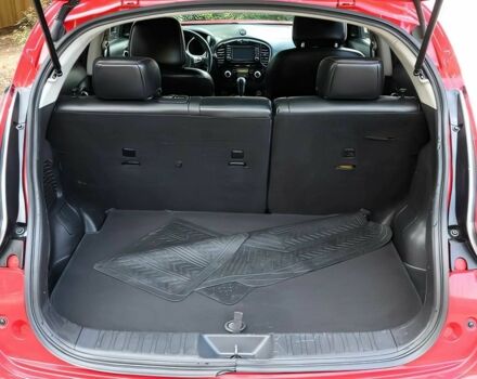 Красный Ниссан Жук, объемом двигателя 1.6 л и пробегом 78 тыс. км за 6000 $, фото 13 на Automoto.ua