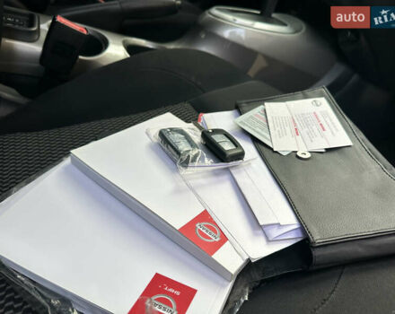 Червоний Ніссан Жук, об'ємом двигуна 1.6 л та пробігом 97 тис. км за 12000 $, фото 11 на Automoto.ua