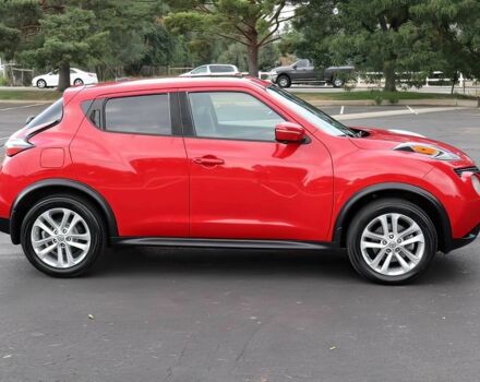 Красный Ниссан Жук, объемом двигателя 1.6 л и пробегом 78 тыс. км за 6000 $, фото 7 на Automoto.ua