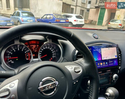 Червоний Ніссан Жук, об'ємом двигуна 1.6 л та пробігом 97 тис. км за 12000 $, фото 9 на Automoto.ua