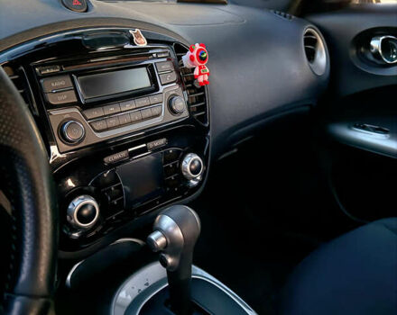 Червоний Ніссан Жук, об'ємом двигуна 1.6 л та пробігом 117 тис. км за 13750 $, фото 5 на Automoto.ua