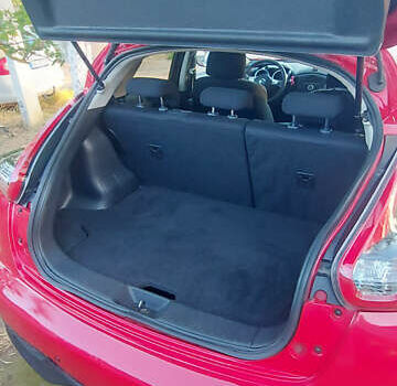 Красный Ниссан Жук, объемом двигателя 1.6 л и пробегом 105 тыс. км за 12500 $, фото 35 на Automoto.ua